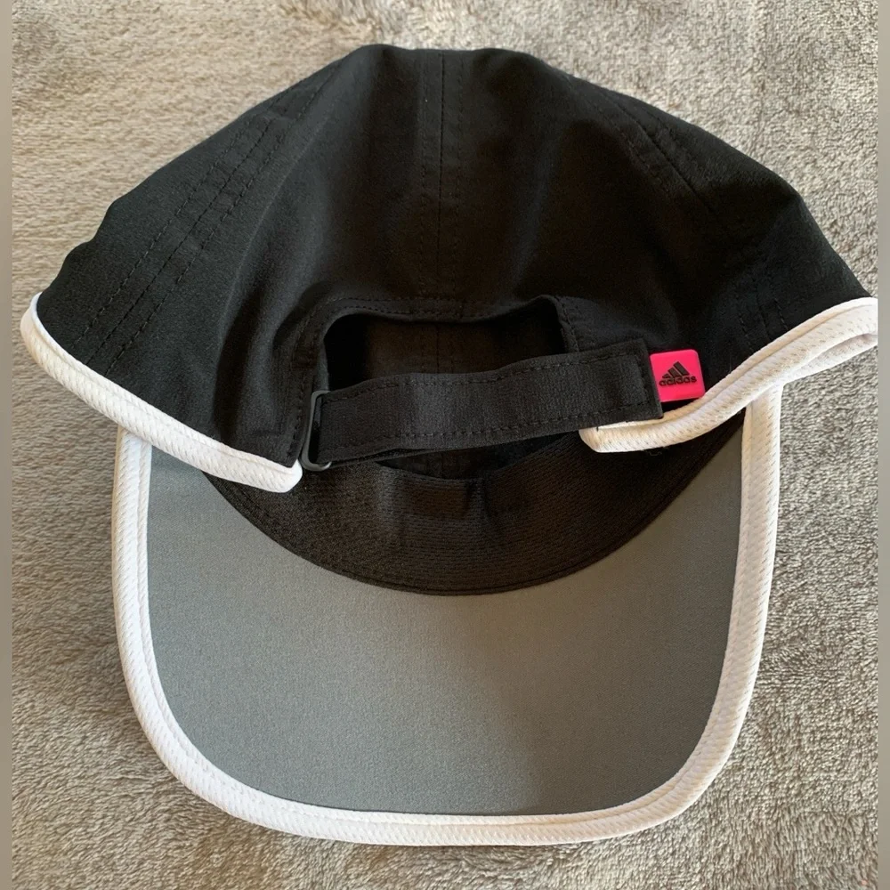 adidas Ball Cap with Pink and White Logo and White Piping. Adjustable.